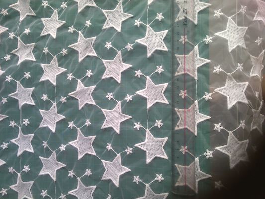 L'organza di Qmilch del pentagramma ha ricamato il tessuto del pizzo, tessuto del pizzo della stella