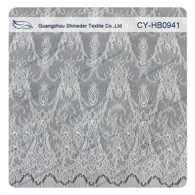 Tessuto elastico del pizzo di elastam & di nylon con il piccolo modello di fiore ellittico
